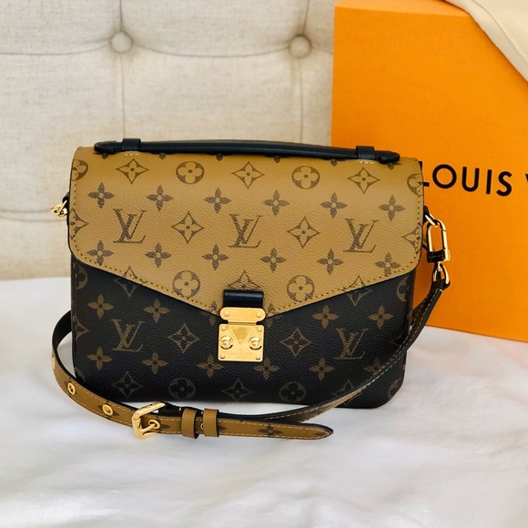 Mossimo Supply Co. Handbags - DO NOT BUY  Pochette Métis Reverse